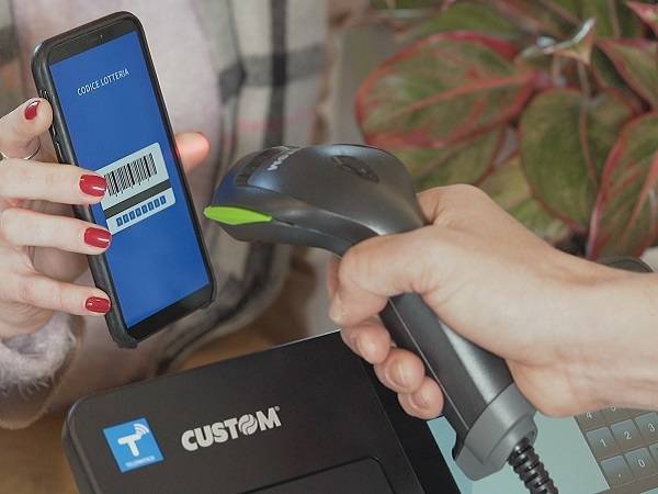 Technoretail - Lotteria degli Scontrini: con uno spot sulle reti Mediaset, Custom si conferma al fianco dei negozianti 